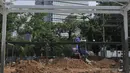 Pekerja mengerjakan kerangka bangunan proyek IRTI Monas, Jakarta, (30/8/14). (Liputan6.com/Johan Tallo)