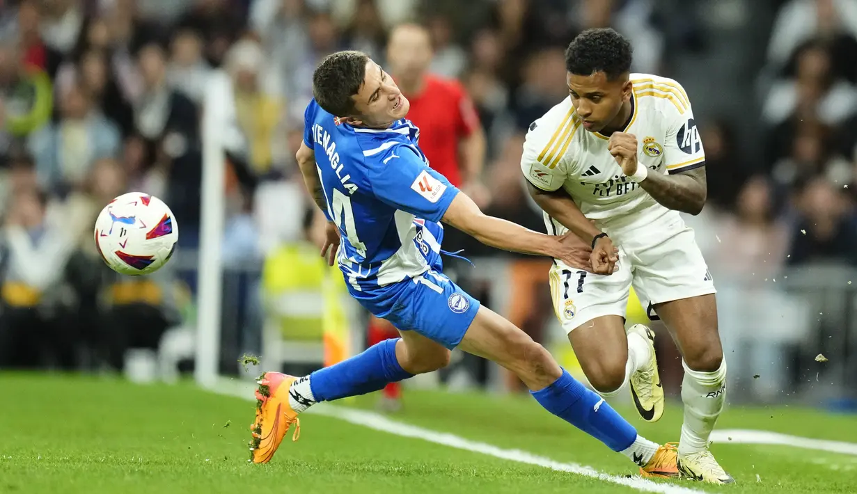 Berkat hasil ini, Real Madrid yang sudah dipastikan menjadi juara semakin kokoh di puncak klasemen dengan poin 93. (AP Photo/Jose Breton)
