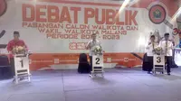 Tiga peserta Pilkada Kota Malang saat debat publik tahap pertama (Liputan6.com/Zainul Arifin)