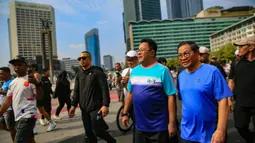 Selain berolahraga pagi, keduanya mengaku kegiatan tersebut untuk menyapa warga. (merdeka.com/Arie Basuki)