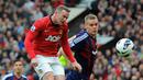 Dalam pertandingan yang sama Wayne Rooney menyundul tendangan bebas Charlie Adam sehingga bola masuk ke gawangnya sendiri untuk memberi Stoke keunggulan pada menit ke-11. (AFP/Andrew Yates)