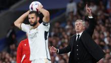 Carlo Ancelotti berhasil mengukir kemenangan ke-173 bersama Real Madrid diseluruh ajang. Kemenangan ke-173 didapat ketika Madrid membungkam Real Sociedad dengan skor 2-1 di Santiago Bernabeu, pada laga pekan ke-5 La Liga, Senin (18/9/2023) dini hari WIB. (AFP/Pierre-Philippe MARCOU)