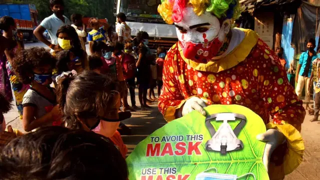Kisah pria India berkostum unik selama mengampanyekan bahaya COVID-19 sekaligus beri masker.
