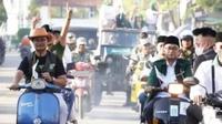 Kader PKB Pamekasan konvoi motor tanpa helm menuju kantor KPU. ©2023 Merdeka.com/Instagram We Care Jatim