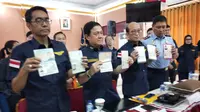 Kemenhumham Kanwil Sumsel menahan 20 orang turis asing yang menyalahgunakan visa wisata di Palembang (Liputan6.com / Nefri Inge)