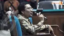 Ahmad Fathanah saat memberikan keterangan di persidangan. Dalam persidangan kala itu, Fathanah mengaku telah mencuri dokumen KPK. (Liputan6 com/Danu Baharuddin)