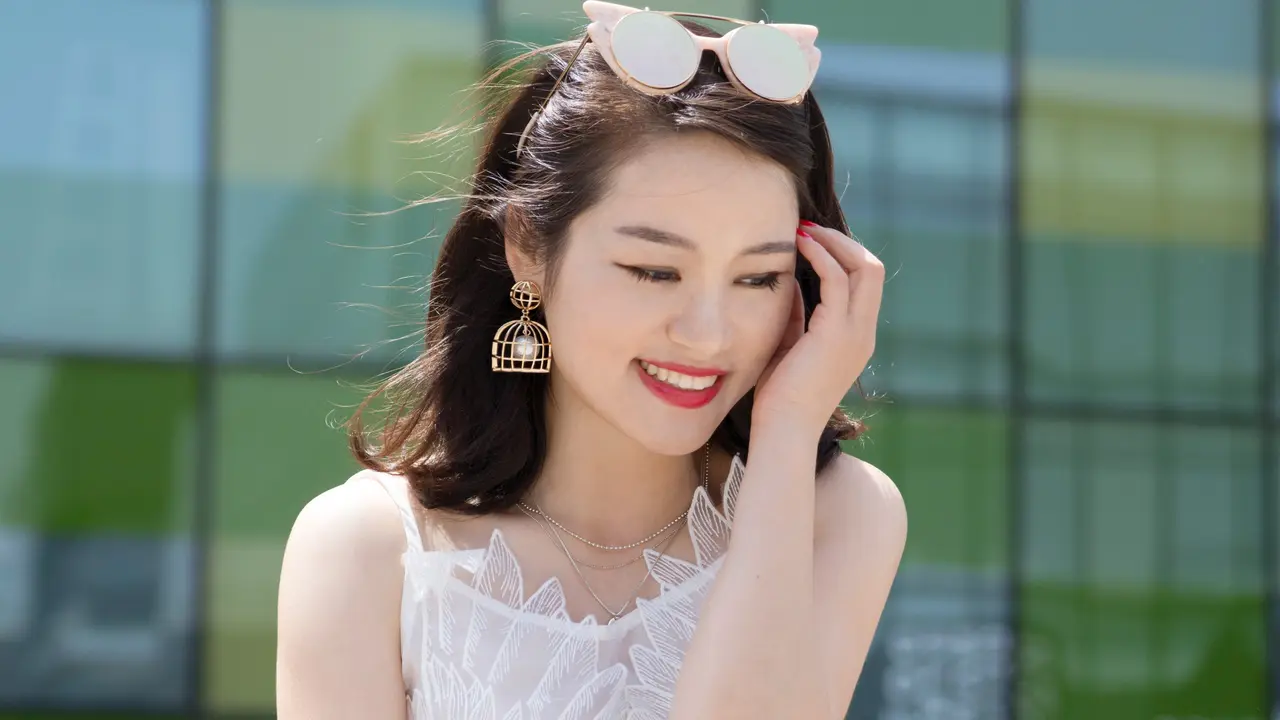 Senyum cantik