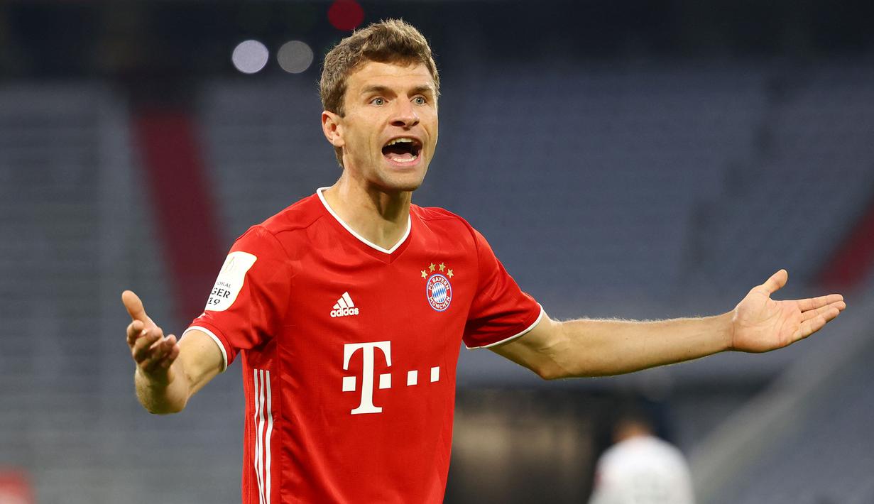 Thomas Muller adalah pemain yang telah mendapatkan banyak trofi ketika bermain di Bayern Munich maupun di Timnas Jerman. Ia menyabet treble winner musim 2012/2013 dan Piala Dunia pada 2014. Namun ia hanya mampu berada di posisi lima besar pada ajang Ballon d'Or. (Foto: AFP/Pool/Kai Pfaffenbach)