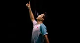 Pebulu tangkis Indonesia, Jonatan Christie merayakan kemenangannya di final tunggal putra melawan Anders Antonsen dari Denmark di turnamen bulu tangkis Korea Open di Suwon, Korea Selatan pada Minggu 28 September 2025. (ANTHONY WALLACE/AFP)