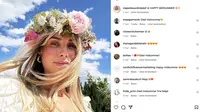 Istri dari bek Manchester United Victor Lindelof, Maja Nilsson dalam balutan gaun putih serta mahkota bunga ketika merayakan tradisi Midsummer.&nbsp;(Foto: Instagram/@majanilssonlindelof)