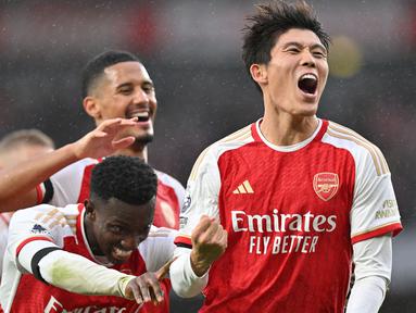 Di balik kehebatan Arsenal asuhan Mikel Arteta dalam beberapa musim terakhir di Liga Inggris, terdapat sosok pesepak bola asal Jepang, Takehiro Tomiyasu yang manjadi andalan di lini belakang The Gunners. Jauh sebelum memutuskan hijrah ke Eropa, pesepak bola kelahiran Fukuoka 25 tahun lalu ini merupakan alumnus J.League bersama Avispa Fukuoka. (AFP/Glyn Kirk)