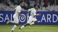 Gelandang Timnas Indonesia, Todd Rivaldo, merayakan gol yang dicetaknya ke gawang Qatar pada laga AFC U-19 Championship di SUGBK, Jakarta, Minggu (21/10). Indonesia kalah 5-6 dari Qatar. (Bola.com/Vitalis Yogi Trisna)