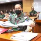 Panglima TNI Jenderal Andika Perkasa bersiap mengikuti rapat dengan Komisi I di DPR RI di Kompleks Parlemen, Jakarta, Senin (24/1/2022). Agenda rapat ini antara lain Strategi dan pendekatan TNI dalam menyelesaikan permasalahan di Papua dan Papua Barat.  (Liputan6.com/Angga Yuniar)