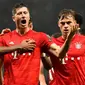 1. Robert Lewandowski (Bayern Munchen / 54 Gol dari 81 laga Liga Champions) - Bomber asal Polandia ini memang merupakan tipikal striker nomor sembilan yang memiliki naluri tinggi dalam mencetak gol. (AFP/Glyn Kirk)