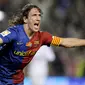 3. Carles Puyol – Mantan kapten Barcelona ini adalah salah satu bek tangguh pada masa nya. Permainan disiplin dan tak kenal kompromi membuat lini belakang Barca seperti benteng yang kokoh. (AFP/Philippe Desmazes)