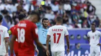 Wasit Omar Mohamed Al-Ali. (Bola.com/Dok.AFP/KARIM JAAFAR).