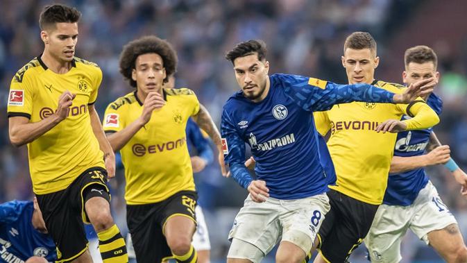 Pertandingan Schalke kontra Borussia Dortmund penanda kembalinya Bundesliga musim ini. (Istimewa)
