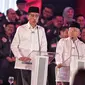 Capres dan Cawapres nomor urut 01 Joko Widodo-Ma'ruf Amin saat Debat Capres Pilpres 2019 pertama di Hotel Bidakara, Jakarta, Kamis (17/1). Debat perdana ini mengangkat tema hukum, hak asasi manusia, terorisme, dan korupsi. (Liputan6.com/Faizal Fanani)