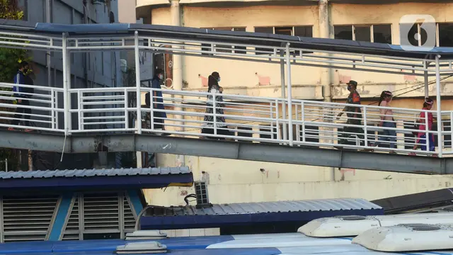 FOTO: Kasus COVID-19 di Indonesia Terus Bertambah
