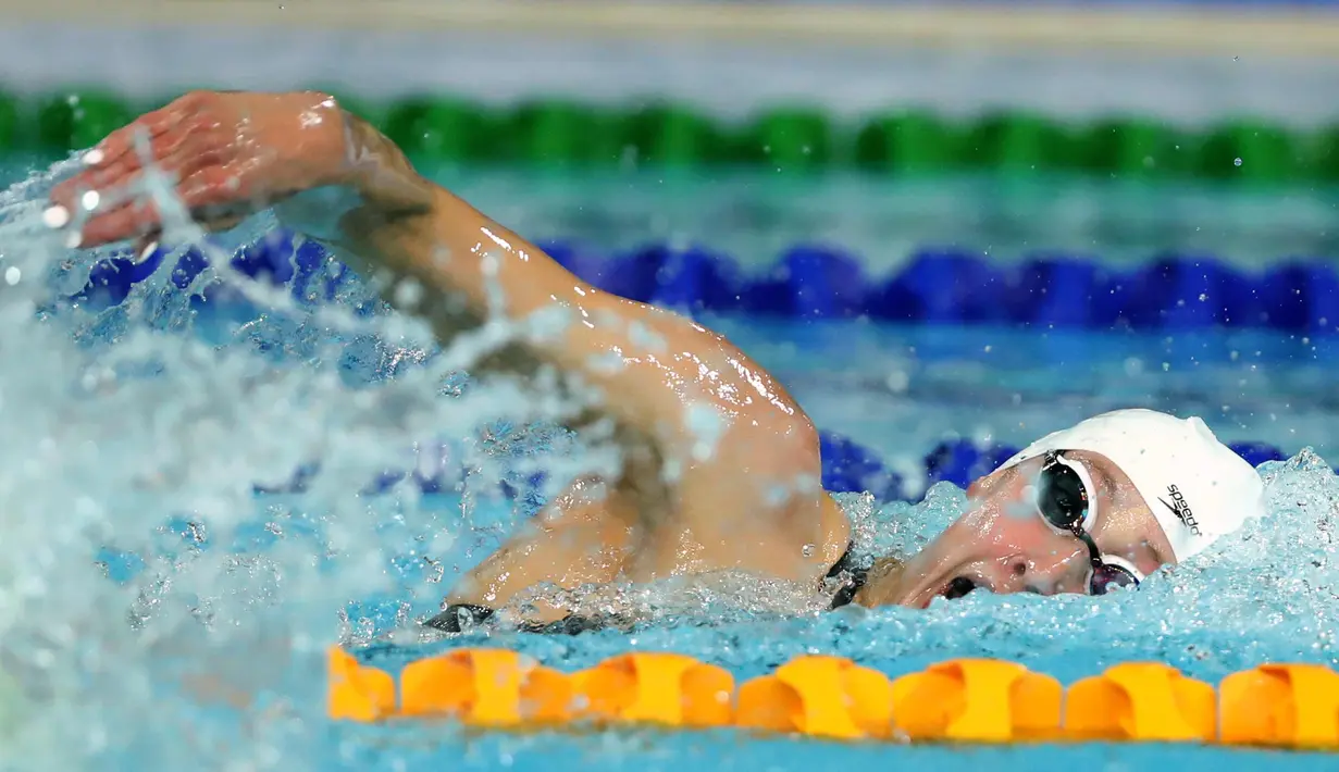 Aksi perenang asal Kanada, Ruck Taylor saat bersaing pada kejuaraan renang 200m gaya bebas putri Commonwealth Games 2018 di Aquatic Center di Gold Coast, Australia (5/4). (AP Photo/Rick Rycroft)