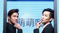 Lee Min Ho berpose bersama lawan mainnya dalam film baru Bounty Hunters, Wallace Chung.