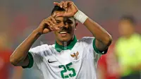 Pemain Timnas Indonesia, Manahati Lestusen, merayakan gol yang dicetaknya ke gawang Vietnam dalam semifinal Piala AFF 2016 di Stadion My Dinh, Hanoi, Rabu (7/12/2016). (Bola.com/Peksi Cahyo)