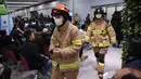 <p>Hingga kini, otoritas setempat masih terus menyelidiki penyebab kecelakaan tersebut. (JUNG YEON-JE/AFP)</p>