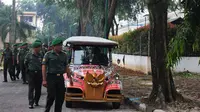 Mobil yang akan digunakan Jokowi untuk antar-jemput ke lokasi ngunduh mantu di Medan, Sumatera Utara. (Liputan6.com/Reza Efendi)