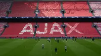Suasana latihan Tottenham Hotspur jelang laga semifinal Liga Champions di Stadion Johan Cruyff, Rabu (8/5). Tottenham Hotspur akan menghadapi Ajax Amsterdam. (AFP/Emmanuel Dunand)
