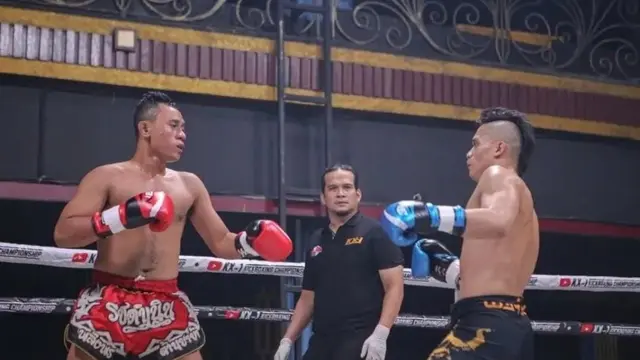 Robby R Sonjaya, saat menjadi wasit di salah satu ajang olahraga kick boxing (Liputan6.com/Istimewa)