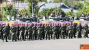 Citizen6, Surabaya: Brigadir Jenderal TNI A Faridz Washington menutup kepelatihan dalam Negeri tank Amfibi BMP-3F Korps Marinir di lapangan apel Karangpilang, Surabaya, Jumat (22/7). (Pengirim: Diyat Akmal)