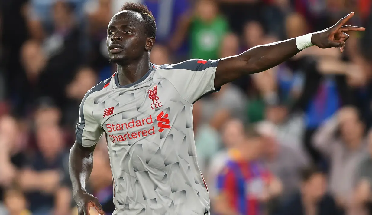 6. Sadio Mane (Liverpool) - 4 Gol. (AFP/Glyn Kirk)