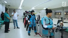 CdM Asian Games 2018, Komjen Pol. Syafruddin (kedua kiri) meninjau pelatnas olahraga menembak di Lapangan Tembak Senayan, Jakarta, Selasa (10/4). Kunjungan ini untuk memantau persiapan jelang laga di Asian Games 2018. (Liputan6.com/Helmi Fithriansyah)