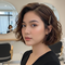 Model Rambut Wanita Pendek Gelombang (created by AI)
