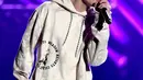 “Aku tak bisa membawakan lagu itu, maaf karena aku tak hapal lirik lagunya,” tutur Justin Bieber. (AFP/Bintang.com)