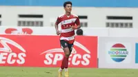 Pemain Madura United, Malik Risaldi, merayakan gol setelah mencetak gol ke gawang Persikabo 1973 dalam laga pekan kesembilan BRI Liga 1 2023/2024 di Stadion Wibawa Mukti, Cikarang, Sabtu (19/8/2023). (Bola.com/Abdul Aziz)