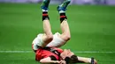 AC Milan mengakhiri kompetisi dengan kekecewaan besar setelah menderita kekalahan tipis 1-2 saat berhadapan dengan Cagliari. (AFP/Piero Cruciatti)