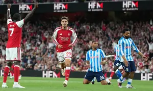 Kai Havertz dari Arsenal, tengah, melakukan selebrasi setelah mencetak gol pembuka pada pertandingan Liga Inggris antara Arsenal dan Coventry City di London, Sabtu (22-8-2026) dini hari WIB. (AP Photo/Kirsty Wigglesworth