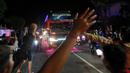 Sejumlah suporter Bali United turun ke jalan untuk merayakan keberhasilan tim kesayangannya menjuarai BRI Liga 1 2021/2022 di Bali, Sabtu (26/3/2022) dini hari. Skuat Serdadu Tridatu berhasil mencatatkan Back to Back usai berhasil mempertahankan juara pada 2019 lalu. (Bola.com/M Iqbal Ichsan)