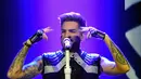 Adam Lambert mulai membuka dirinya seorang homoseksual pada wawancara majalah terkemuka. Adam pun nampaknya tak peduli tentang berbagai hujatan yang mengancam dirinya dan kariernya. (AFP/Bintang.com)