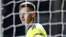 Kiper Manchester United, Dean Henderson, saat melawan Luton Town pada Piala Liga Inggris di Stadion Kenilworth Road, Rabu (23/9/2020). Setan Merah menang dengan skor 3-0. (Cath Ivill/Pool via AP)