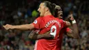 Dua pemain Manchester United, Zlatan Ibrahimovic dan Paul Pogba, merayakan gol ke gawang Southampton. Ibrahimovic resmi kembali perkuat Manchester United. (AFP/Oli Scarff)