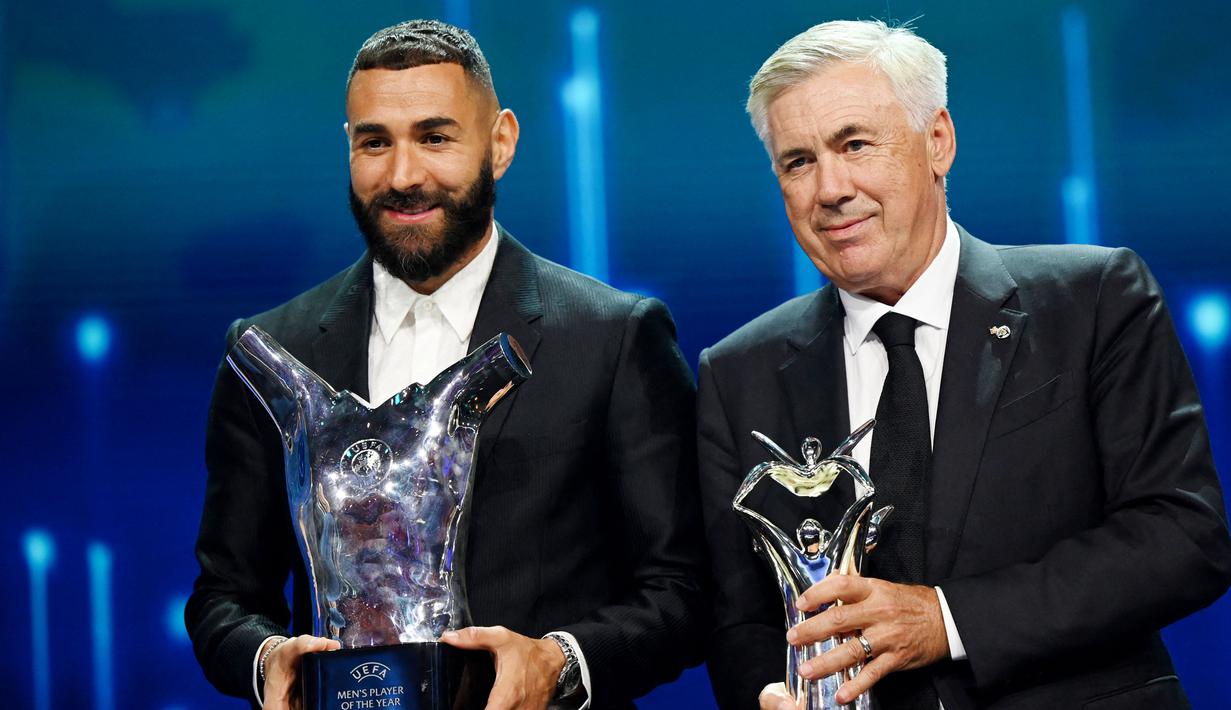 Sementara itu predikat pelatih terbaik versi UEFA tahun 2022 menjadi milik Carlo Ancelotti. Pelatih asal Italia ini merupakan tokoh kunci sukses Real Madrid mengawinkan titel juara La Liga dan Liga Champions musim 2021/2022. (AFP/Ozan Kose)