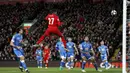 Striker Liverpool, Divock Origi, mencetak gol dengan tandukan kepalanya. Pada laga tersebut Liverpool memakai skema 4-3-3 sementara Bournemouth memakai formasi 4-5-1. (AP/Martin Rickett).