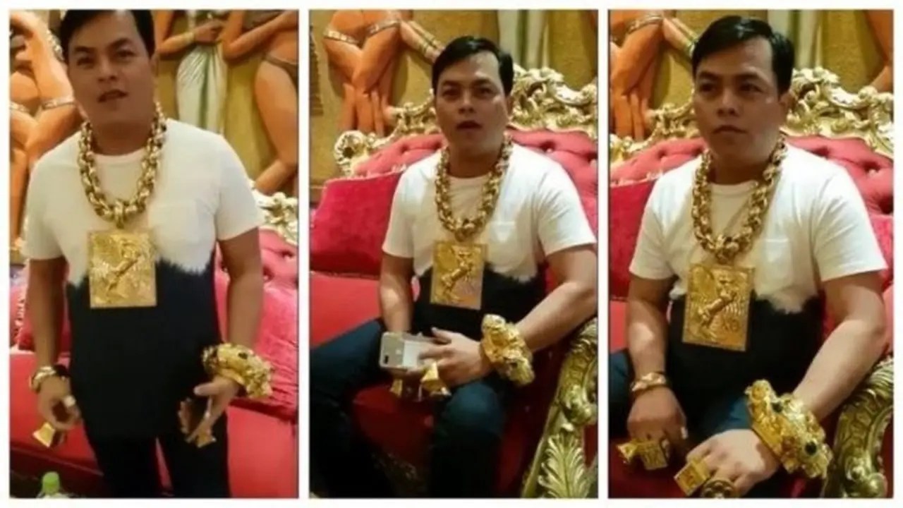 pria mengenakan emas 13 Kg (foto: Odditycentral)