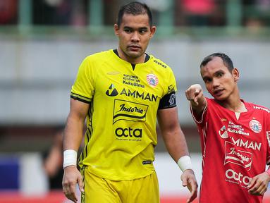 Kompetisi BRI Liga 1 2022/2023 telah usai dengan menobatkan PSM Makassar sebagai jawara. Beberapa penghargaan individu pun telah dianugerahkan kepada para pemain di beberapa kategori. Namun, ada satu kategori yang mungkin terlewatkan seperti pada musim-musim sebelumnya, yaitu kategori kiper terbaik. Jika diadakan, deretan 8 kiper berikut layak dicalonkan menjadi yang terbaik karena memiliki rasio kebobolan paling minim selama berlangsungnya kompetisi BRI Liga 1 2022/2023. (Bola.com/Bagaskara Lazuardi)