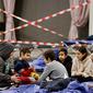 Anak-anak duduk di tempat tidur di pusat pengungsi dari Ukraina di Messe di Berlin, Jerman pada 11 Maret 2022. Badan PBB untuk urusan pengungsi (UNHCR) mengatakan setidaknya 2,5 juta orang telah meninggalkan Ukraina, dengan lebih dari setengahnya sekarang di Polandia. (Odd ANDERSEN / AFP)