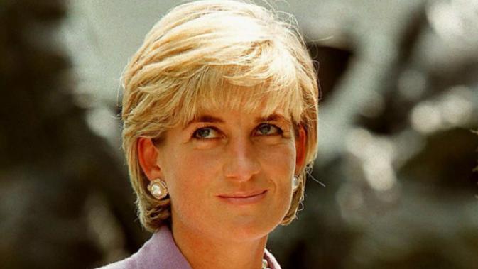 Meghan Markle - Pangeran Harry menulis kalimat menggugah dari Putri Diana.  (AFP PHOTO / JAMAL A. WILSON)