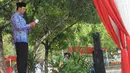 Ahok menyampaikan pidato di Lapangan IRTI Monas, Jakarta, Senin (10/11/2014). (Liputan6.com/Herman Zakharia)