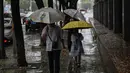 Departemen pengendalian banjir kota mengatakan bahwa mereka telah mengerahkan 203.230 personil penyelamat dan 3.031 orang telah dievakuasi, demikian dilaporkan media lokal. (Pedro PARDO / AFP)